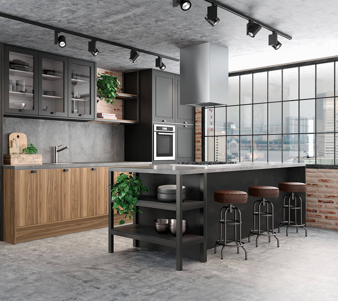 Una cocina con una gran isla en el medio de la habitación.