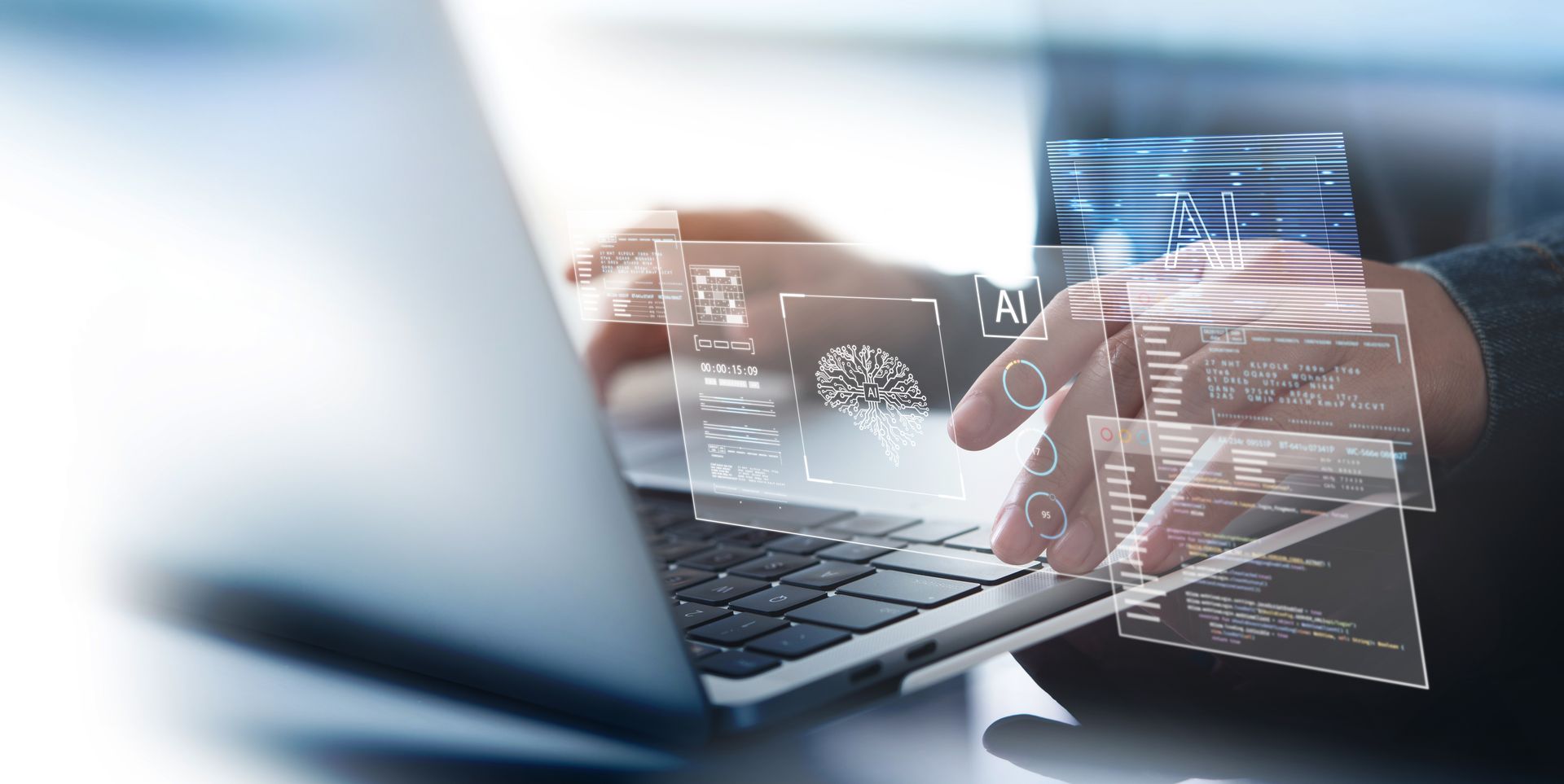 Uma pessoa está usando um laptop com uma tela futurista.