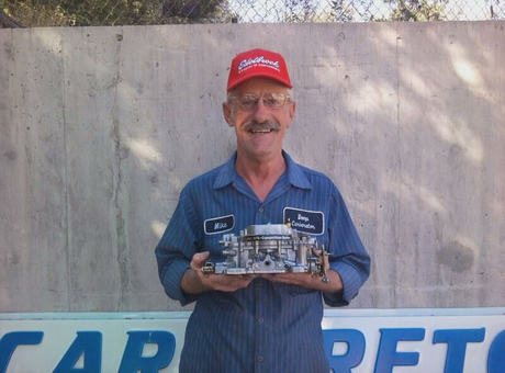 Owner is holding a carburetor