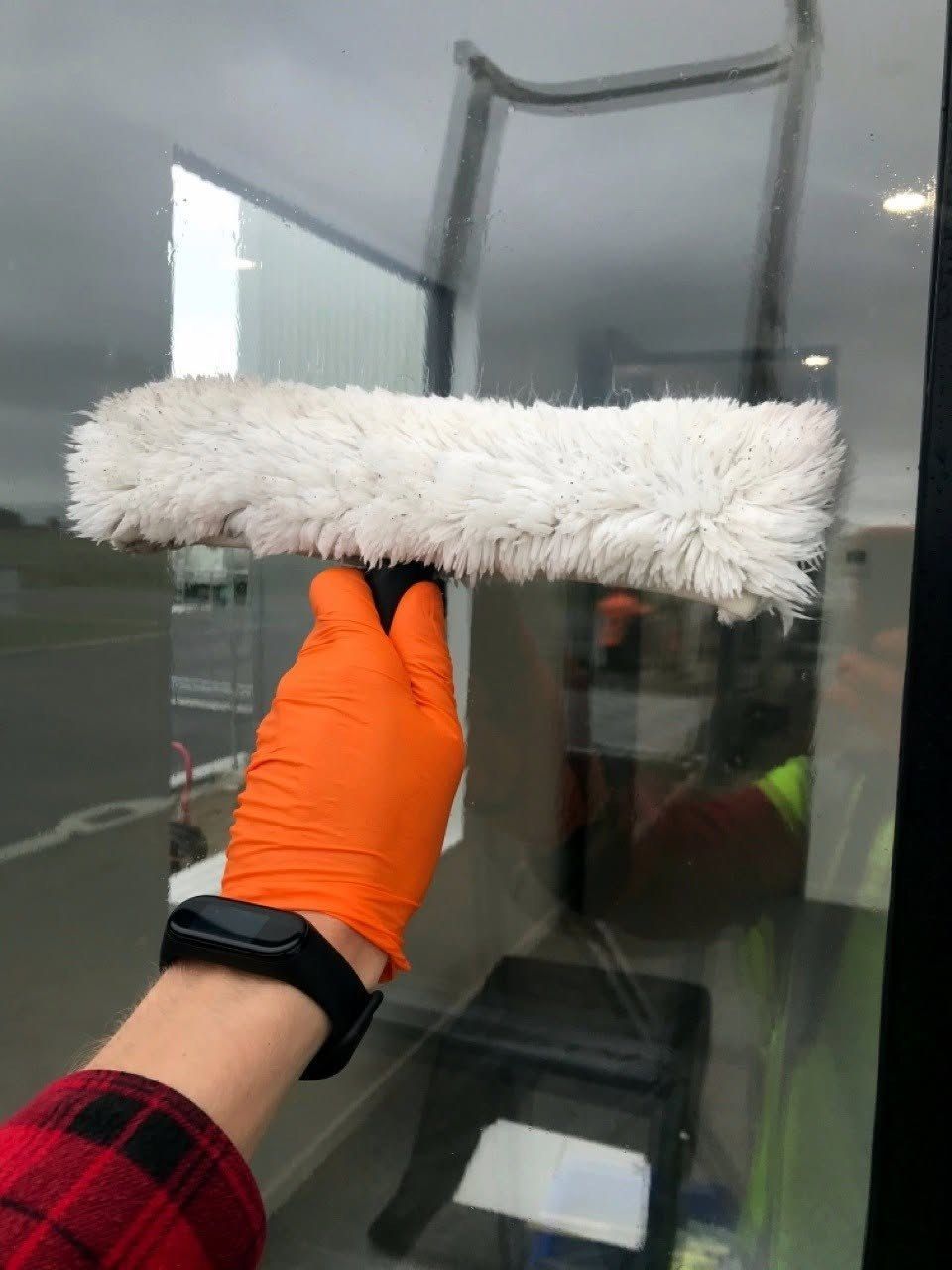 Close-up professional window cleaning detail
