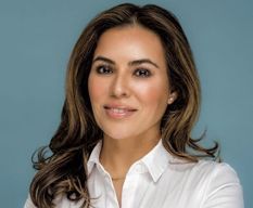Portrait of a woman in a white shirt 