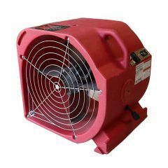 Red industrial blower fan with metal safety grill.