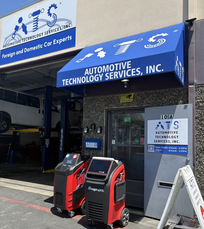 Automotive Technology Services Entrance with AC Machines | Automotive Technology Services, Inc.