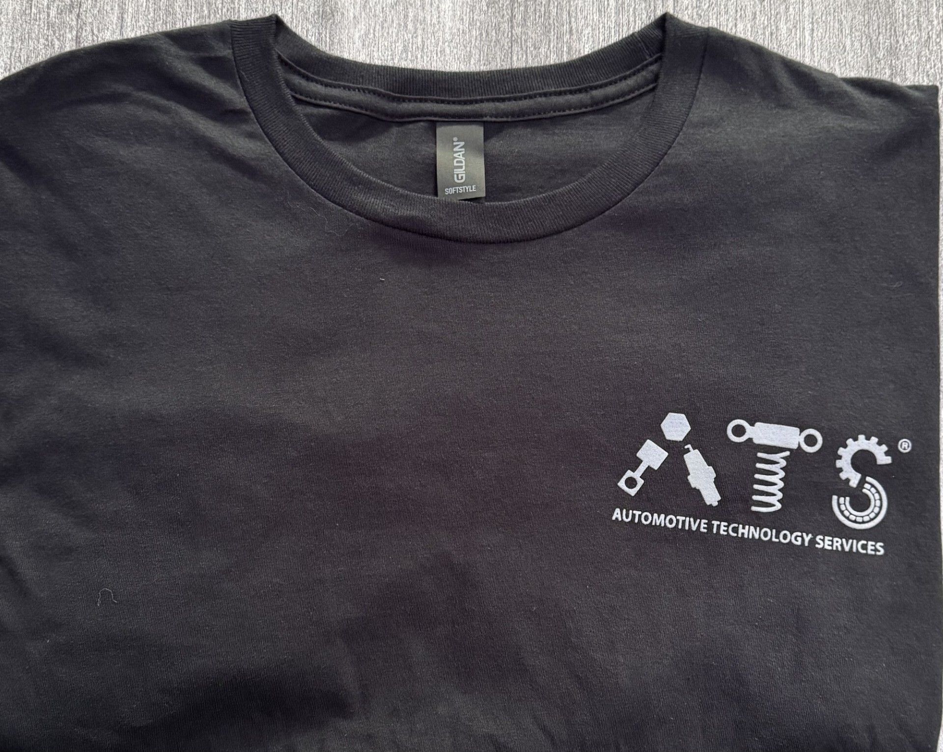 Black Shirt Front | Automotive Technology Services, Inc.