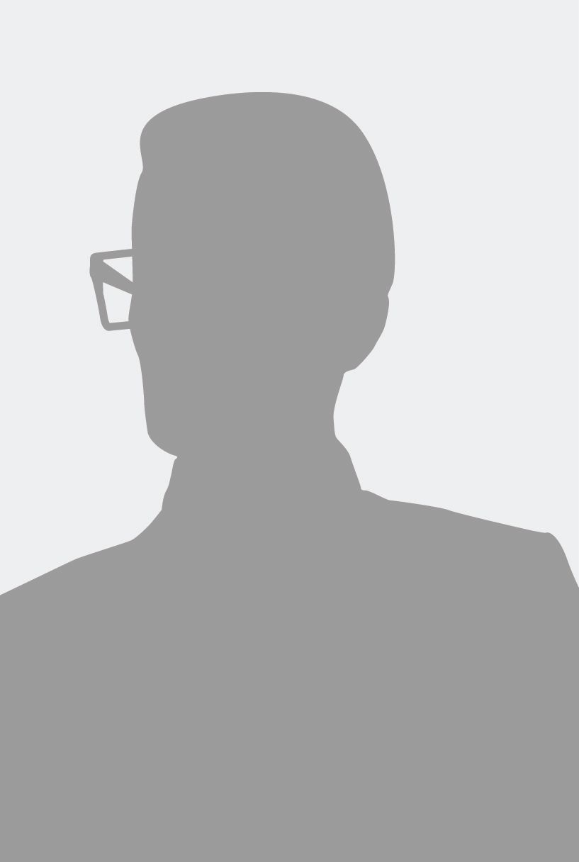 Gray silhouette of a person in glasses against a light background