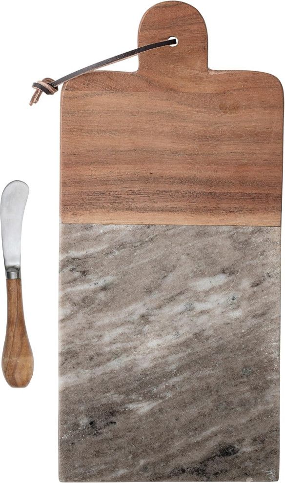 Wood and stone cutting board with a spreading knife beside it
