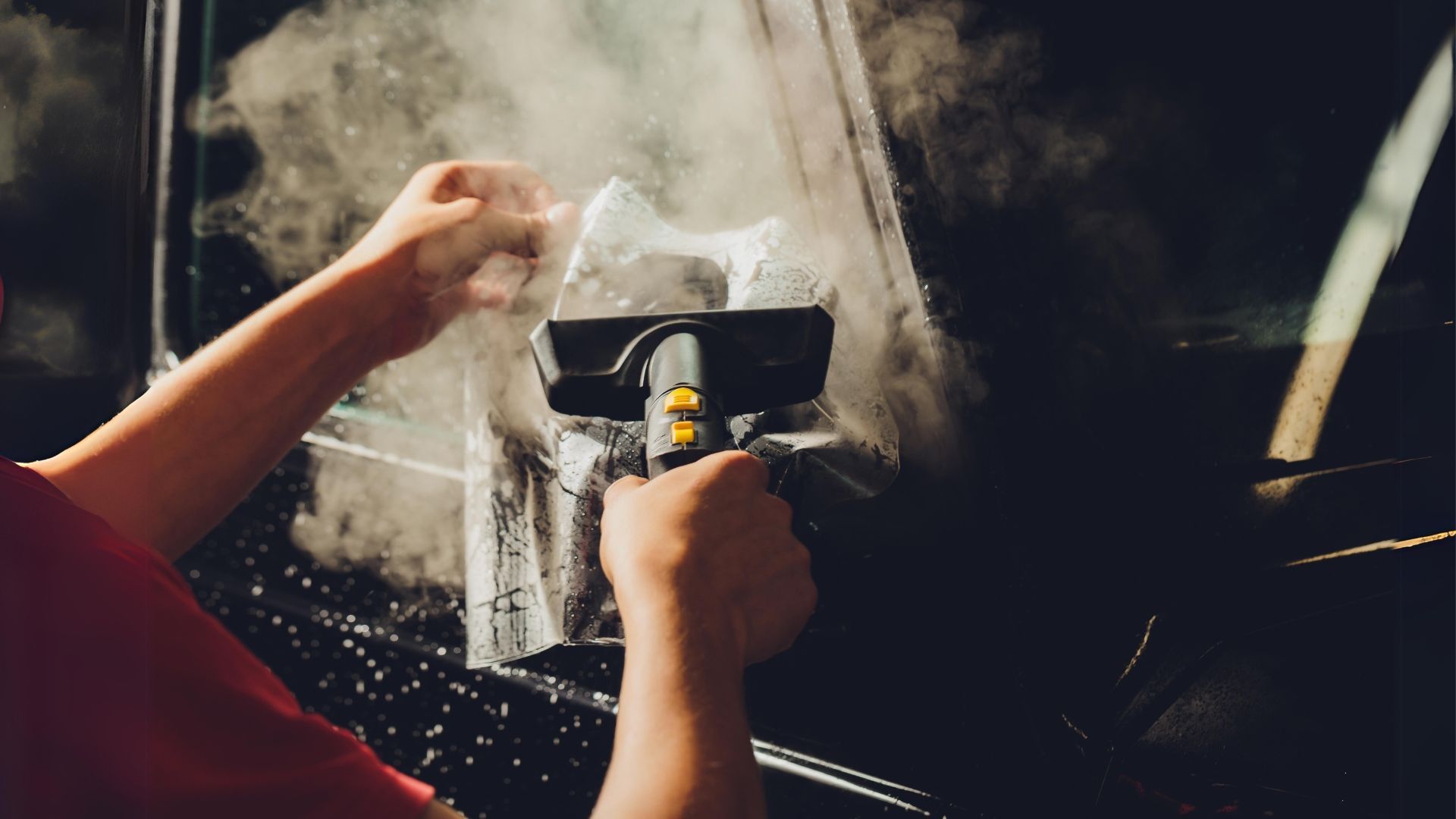 A Clear Bra for Cars being applied onto a vehicle by a skilled auto body technician