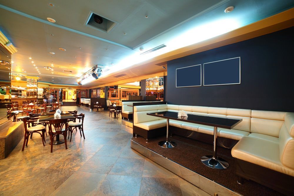 Pub seating and bar area — Hotel Brokers in Mount Lofty, QLD