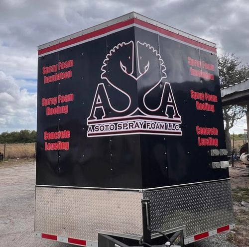 Black trailer with red trim and ASA logo, labeled “A Society of Prisoners,” parked outdoors.