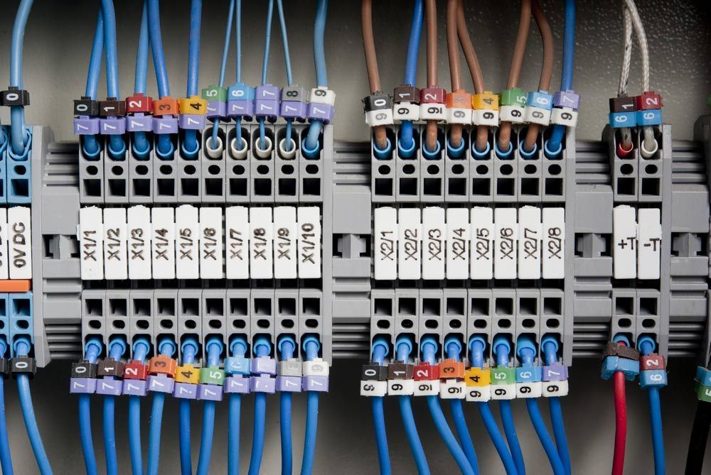 A Bunch of Wires Are Connected to a Gray Electrical Box — Atherton Electrical in Atherton, QLD