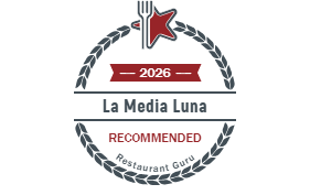 Restaurant Guru 2026 Recommended badge for La Media Luna, with laurel wreath and red star logo