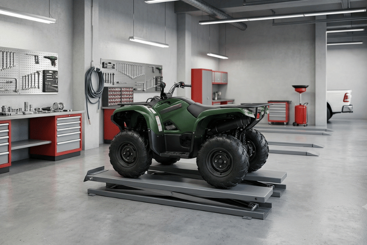 Green ATV positioned on a service lift inside a clean, modern repair shop