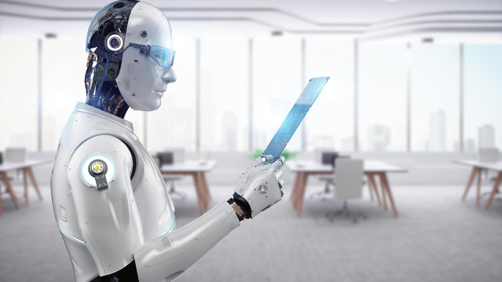 A robot is holding a tablet in an office.