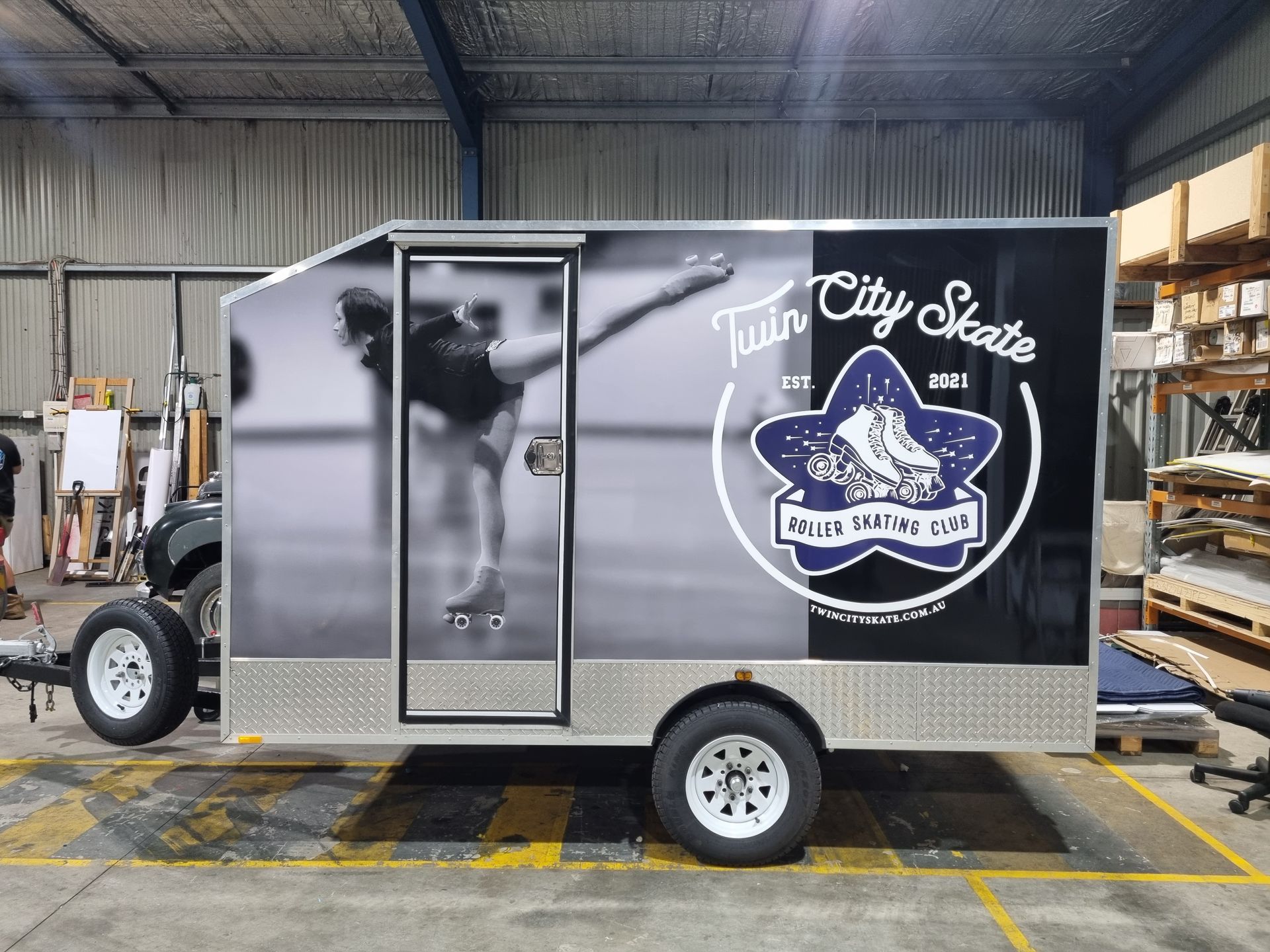 A Trailer With a Picture of a Ballerina on It and the Words Twin City Skates on It — Robinsons Sign Makers in Lavington, NSW