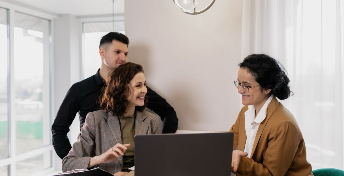 couple working with insurance agent