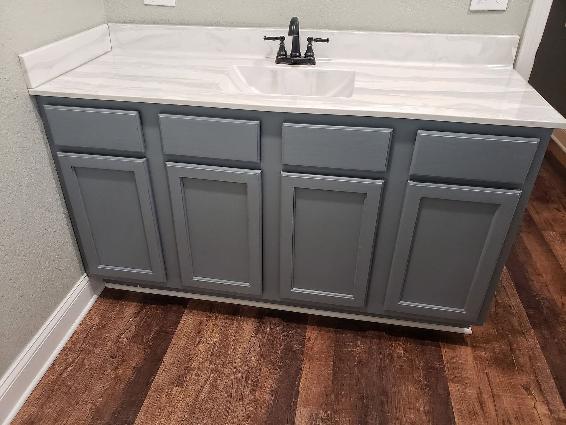 grey bathroom cabinets with white counter