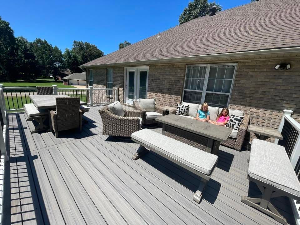 spacious deck with furniture