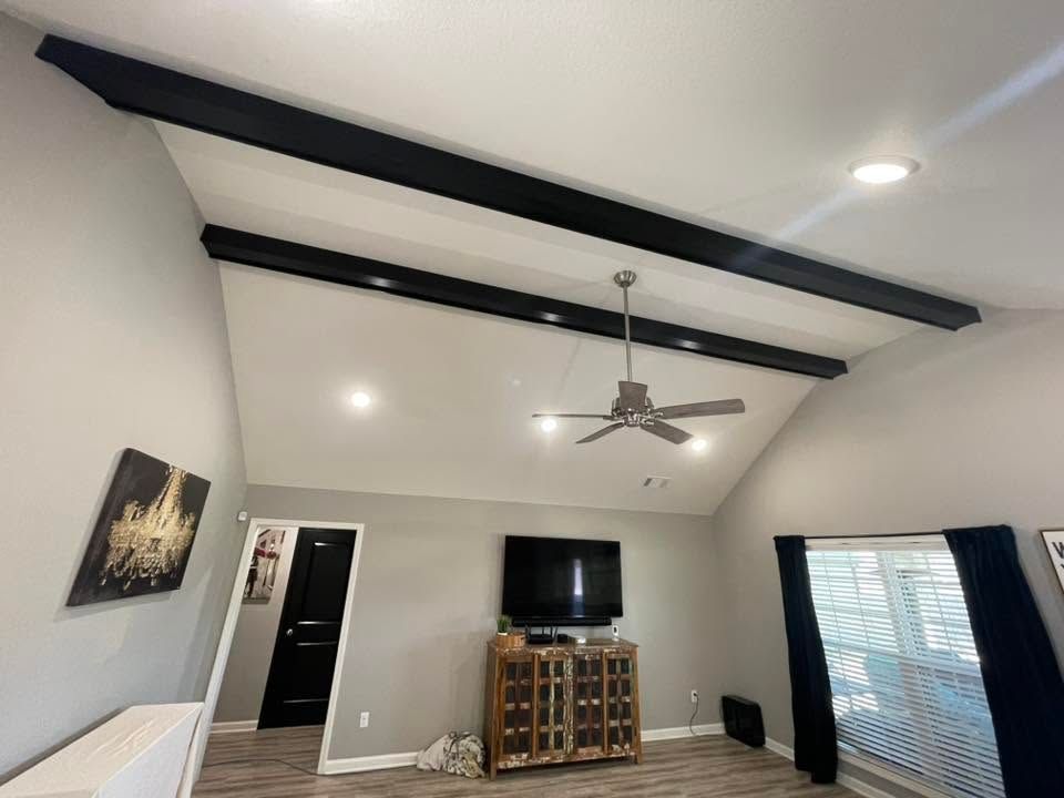 vaulted ceiling with wood beams