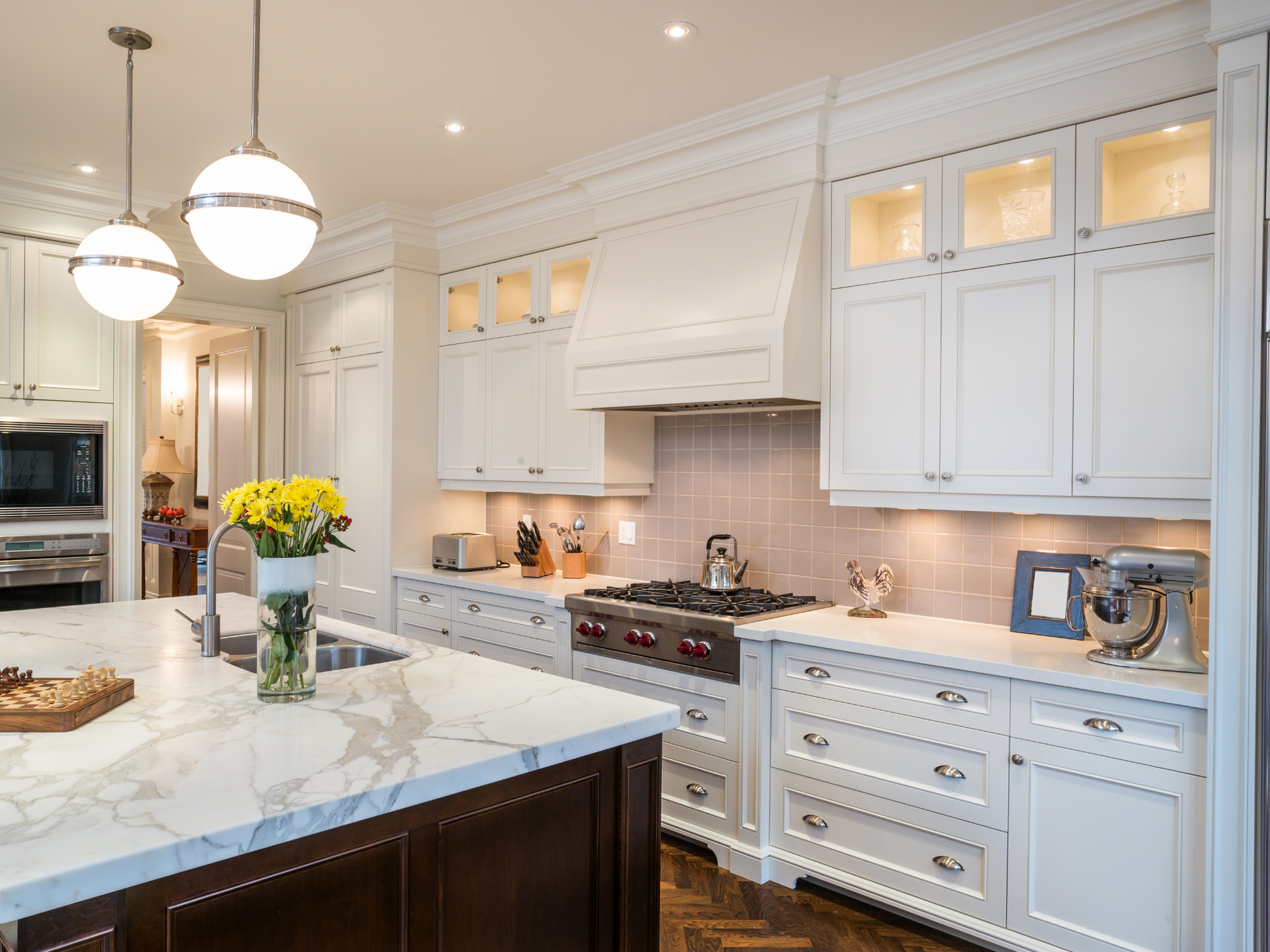 modern white kitchen with large island