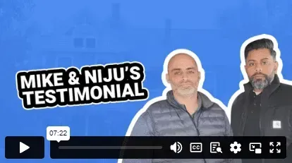 Two men are standing next to each other on a blue background.