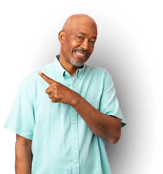 A man in a blue shirt is pointing at something.