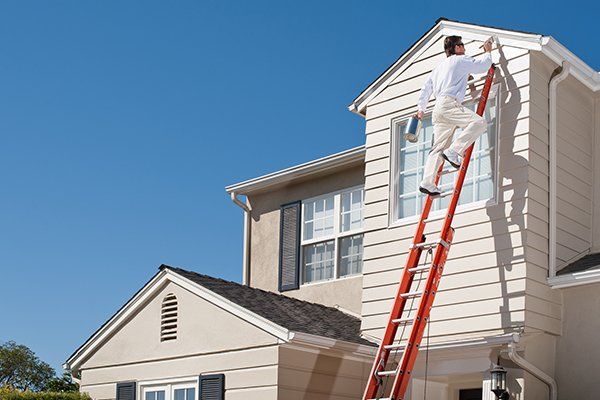 House painter with paint brush — La Selva Beach, CA — J's Custom Painting