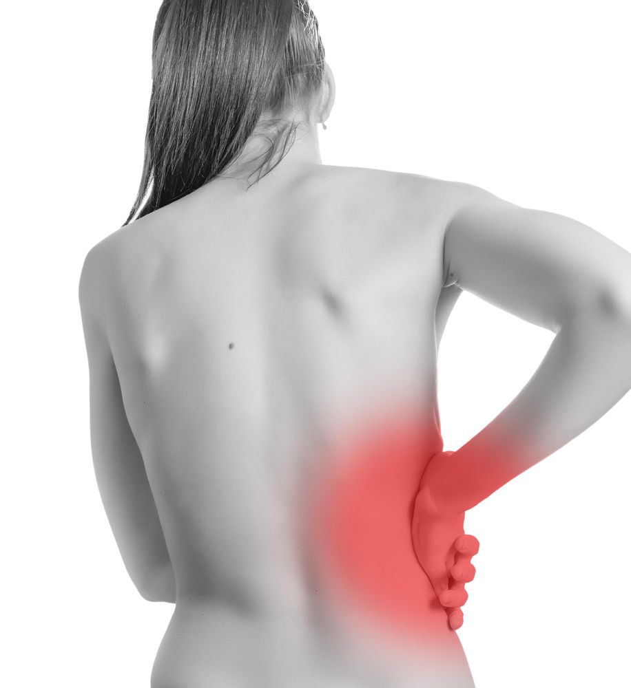 Woman touching lower back, red highlight indicating pain.