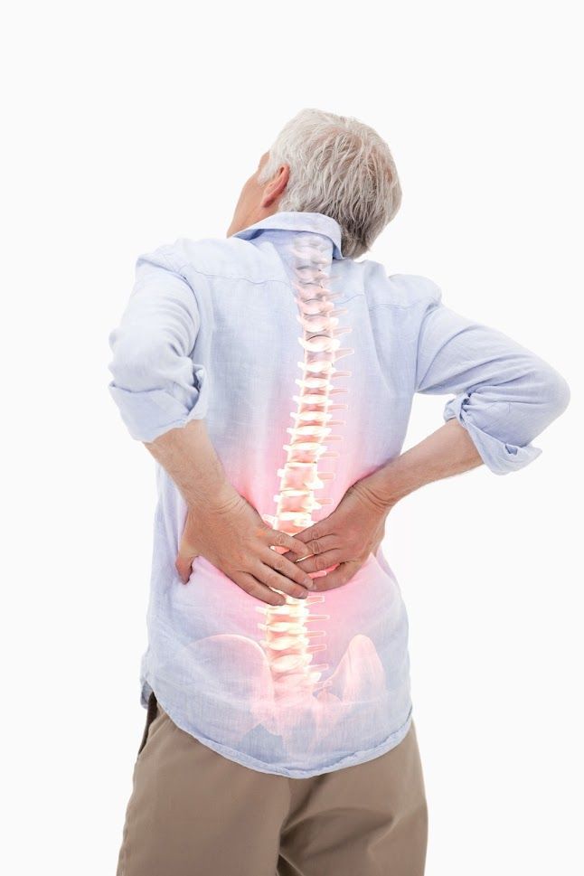 Man holding back in pain, with glowing spine overlay.