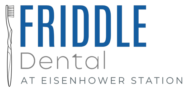 Friddle Dental logo with blue and gray text and a stylized tooth outline