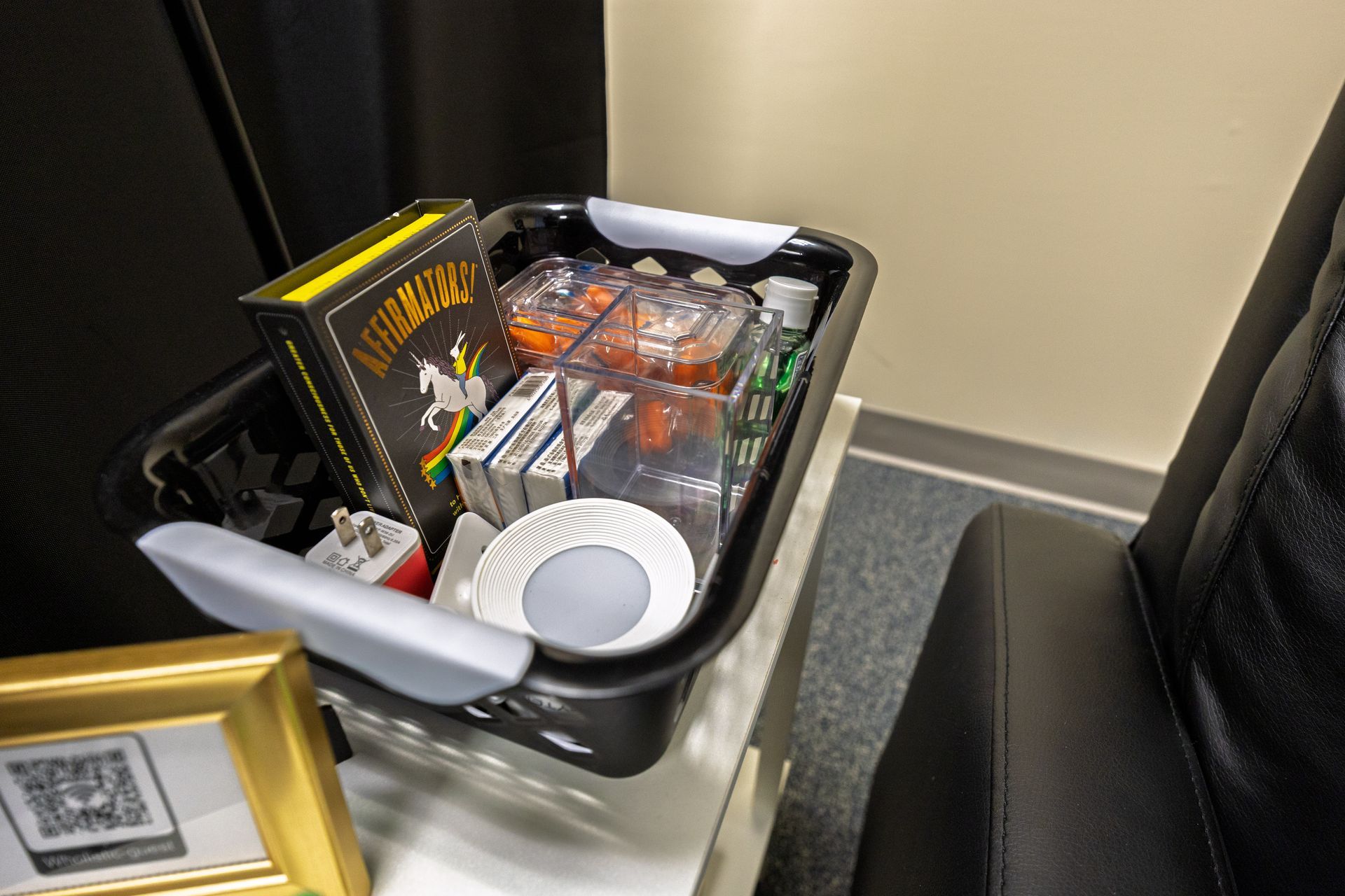 A basket of activities in the treatment room to pass time