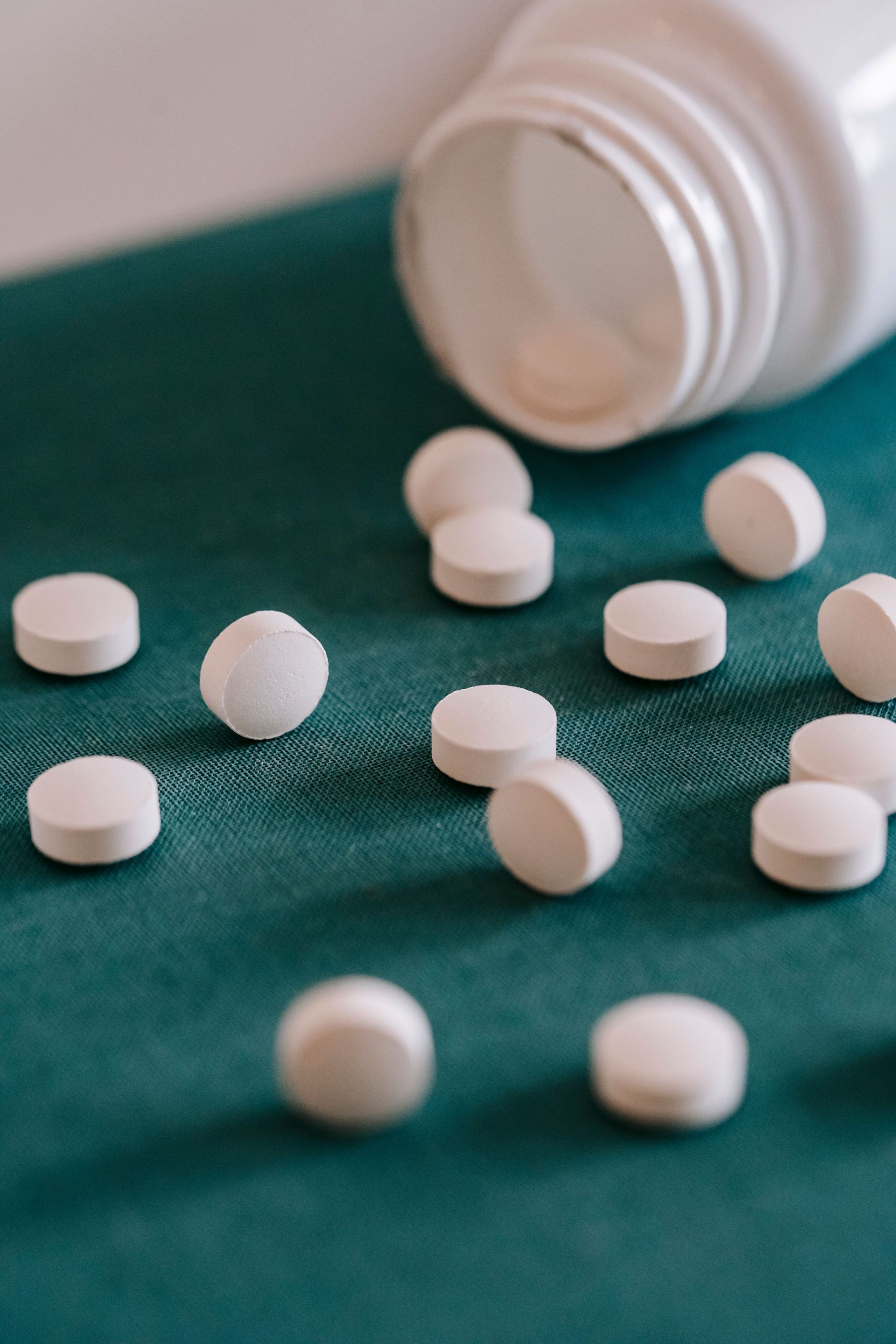 A healthcare provider having a supportive conversation with a patient about medication.