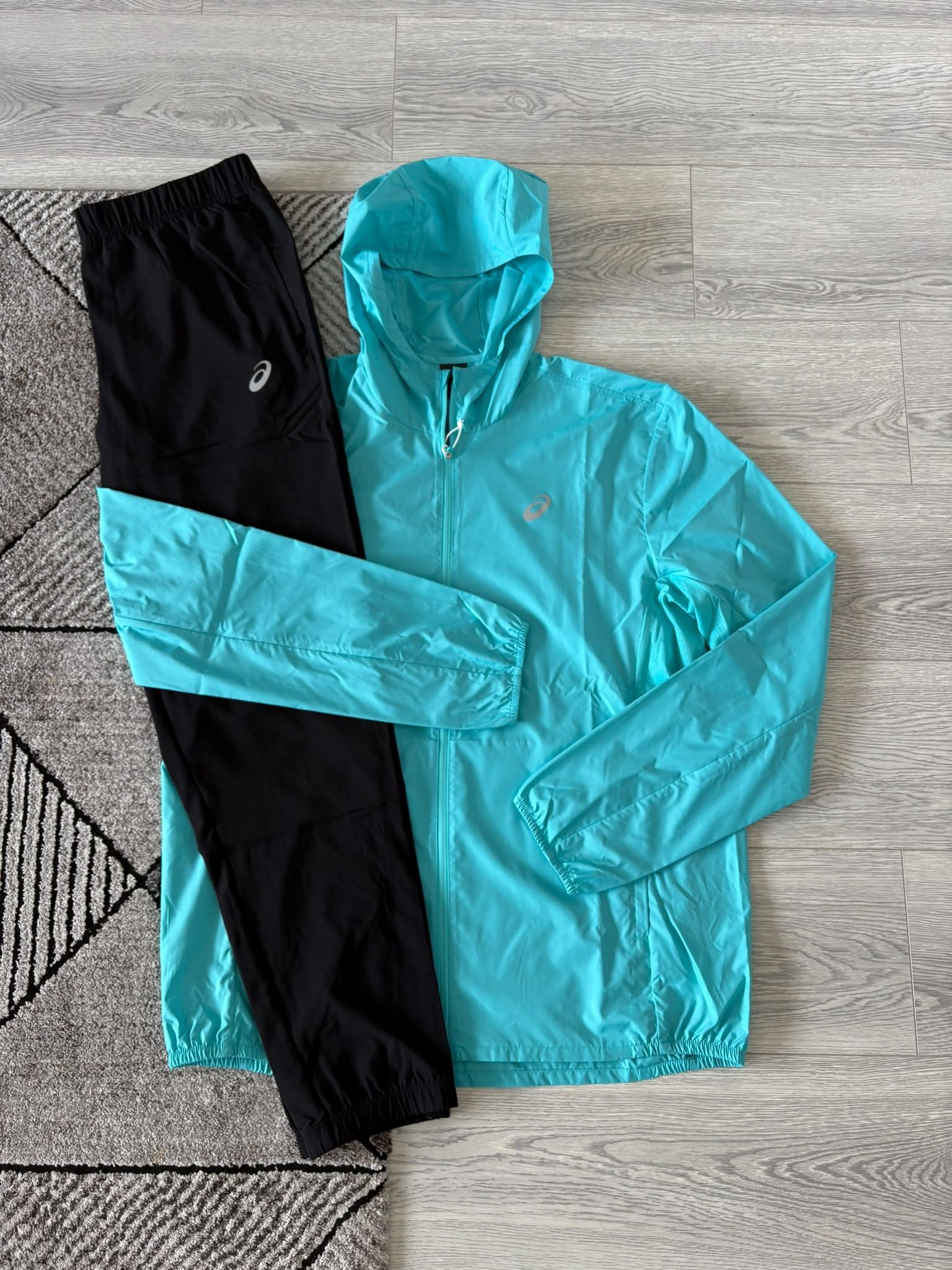 Asics Trainingspak Licht Blauw