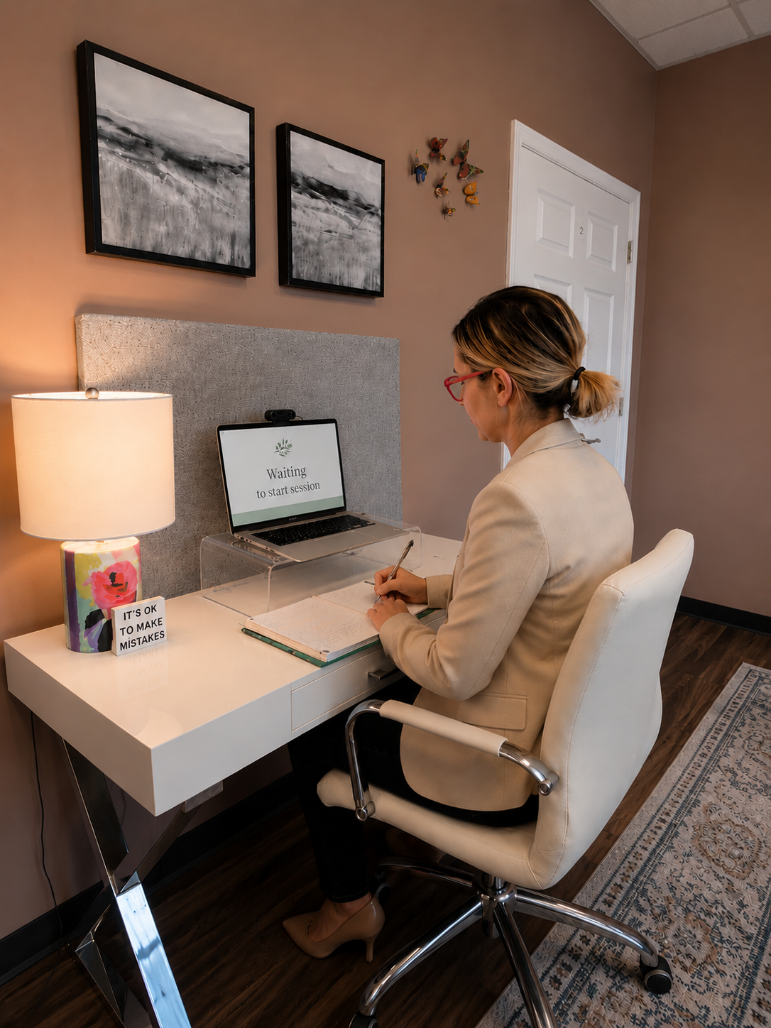 Adult participating in a virtual telehealth therapy session from home with warm lighting