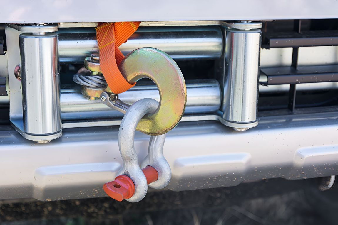 A Winch Hook Is Attached To The Front Of A Vehicle — All Models Service Centre In Port Macquarie, NSW
