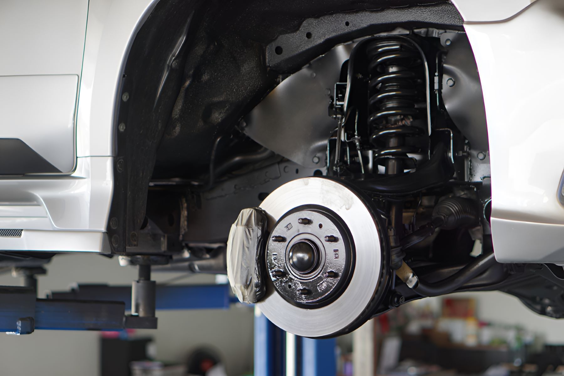 A Car Is Sitting On A Lift In A Garage
— All Models Service Centre In Wauchope, NSW