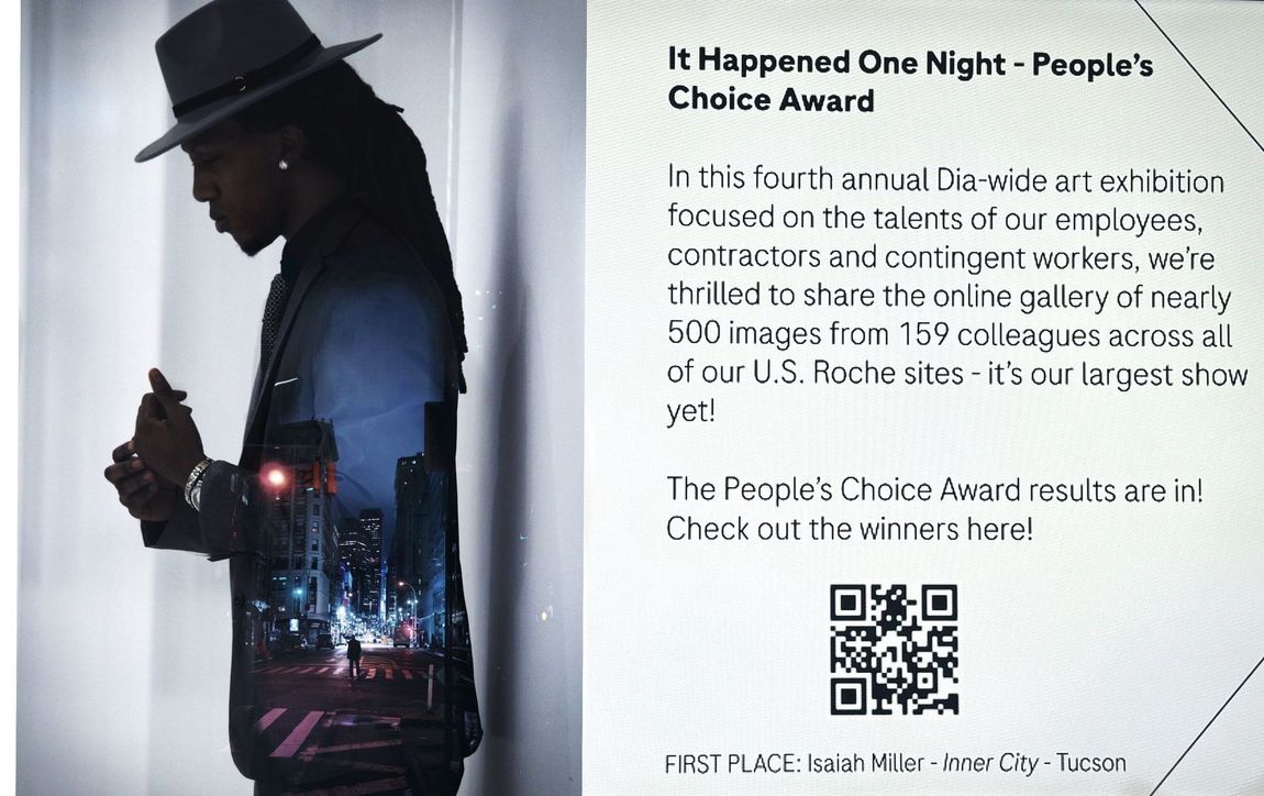 Poster with silhouette of a person, promoting “It Happened One Night” People’s Choice Award and a QR code.