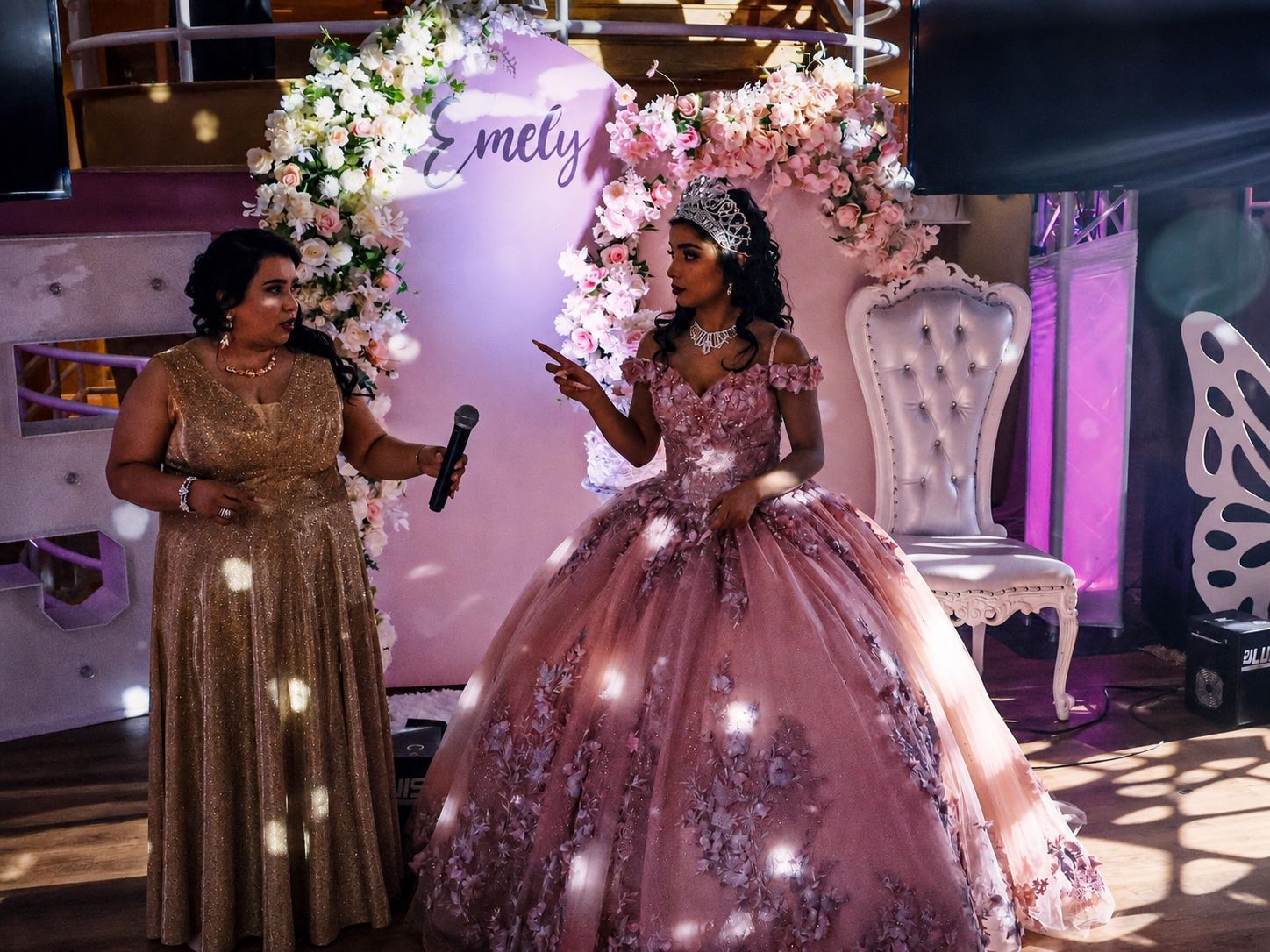 Cinematic edit of a celebrant and guest on a decorated stage
