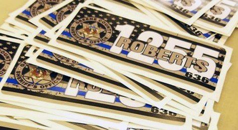 A Stack of Stickers With the Name Roberts on Them
