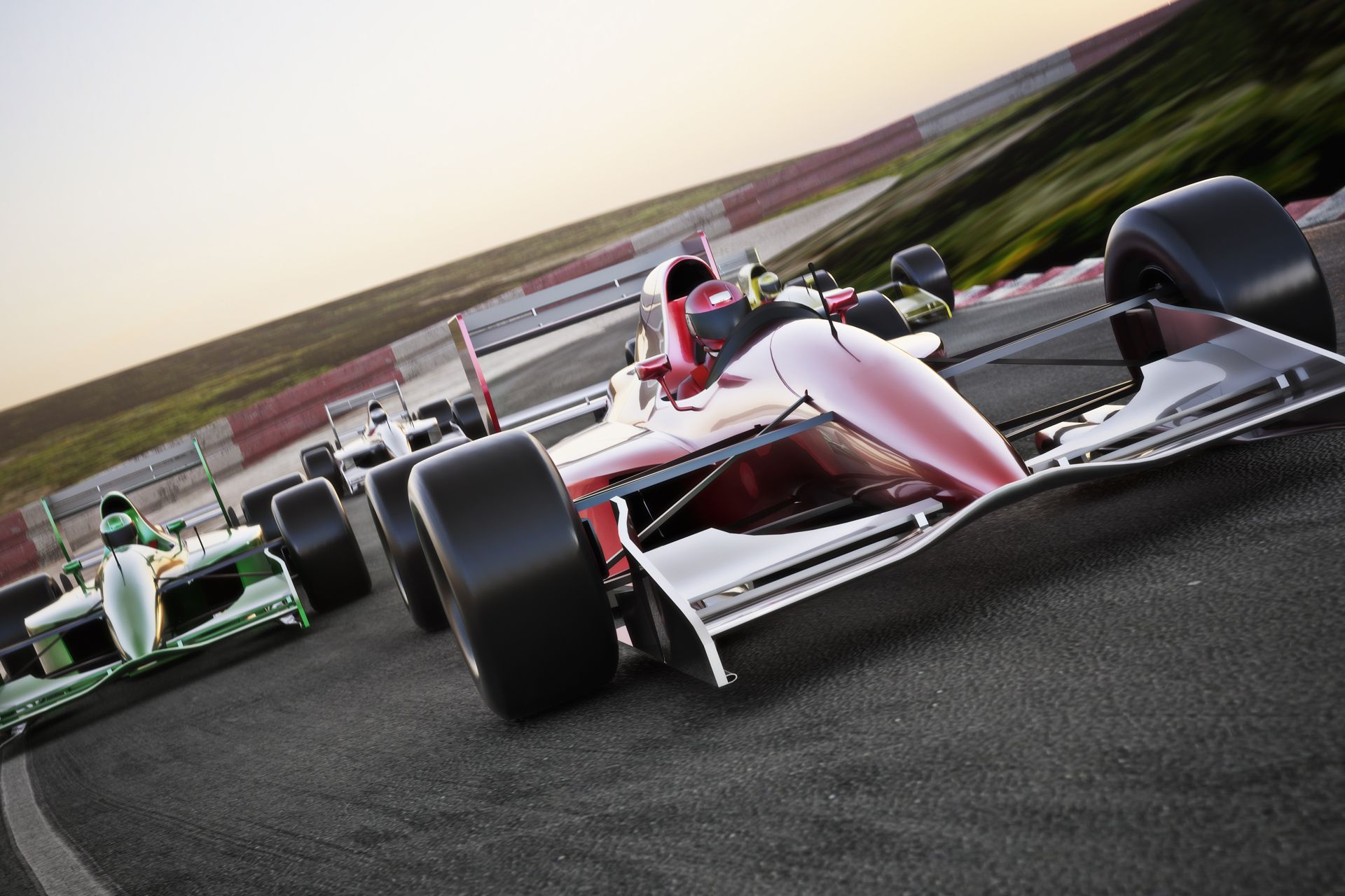 A Row of Race Cars Are Racing on a Track