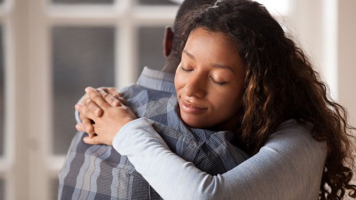 woman hug black