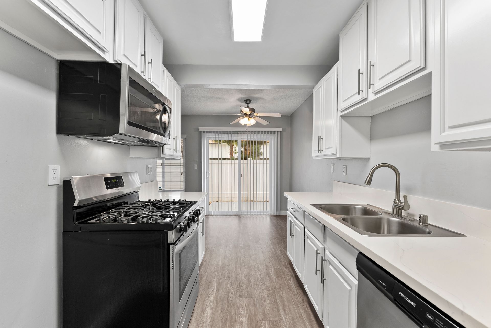 The Jackson apartment kitchen dark appliances