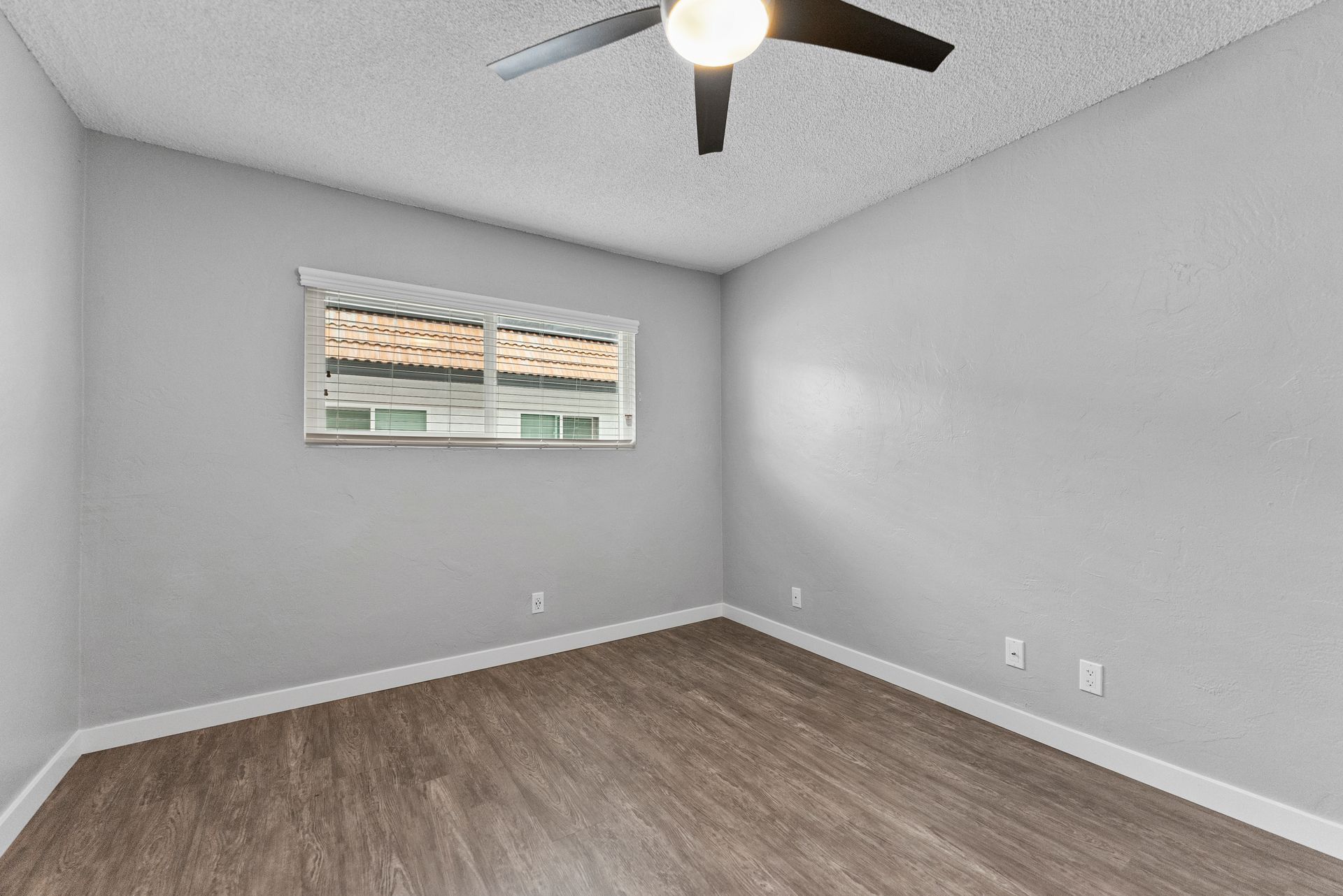 The Jackson apartment bed room with closet and fan close up