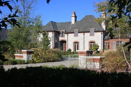 Stunning residential property boasting an expertly installed asphalt shingle roof by Kreiling Roofing Stunning residential property boasting an expertly installed asphalt shingle roof by Kreiling Roofing