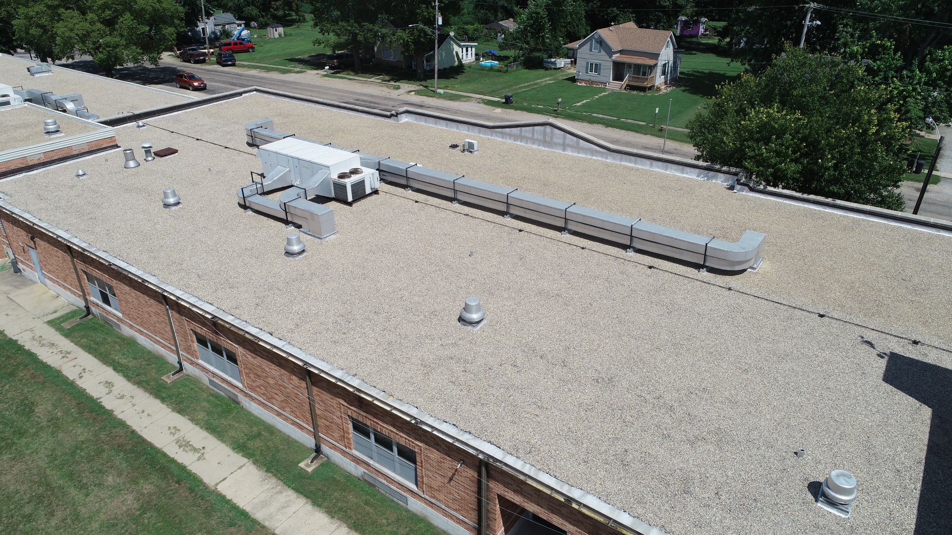 Durable Commercial Built-Up Gravel Roof with Protective Aluminum Coated Flashings