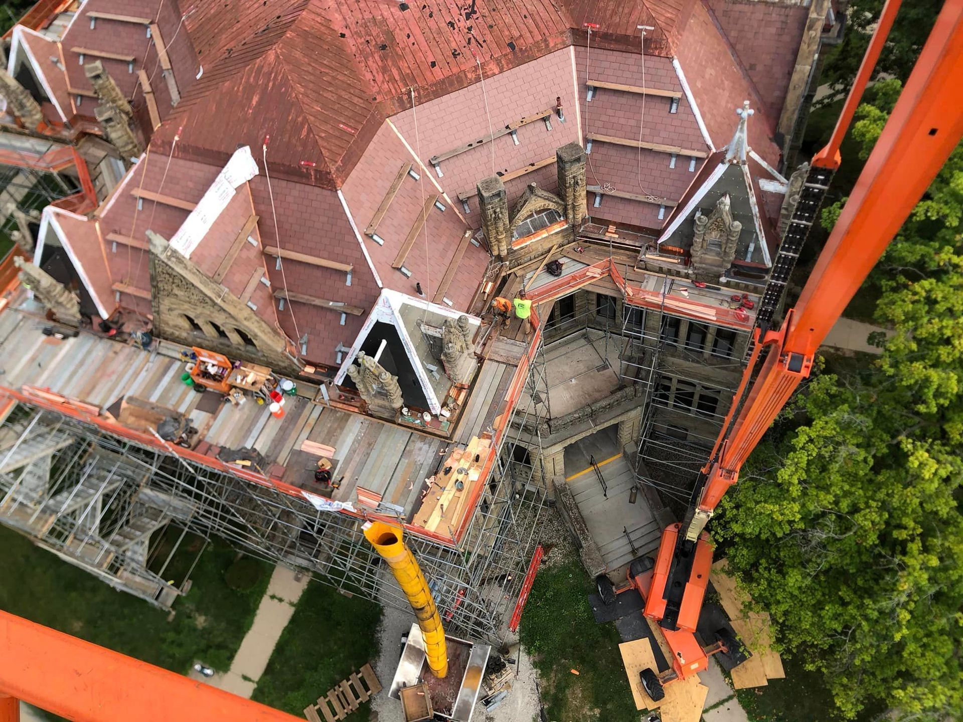 Aerial view showcasing copper and slate craftsmanship in-progress