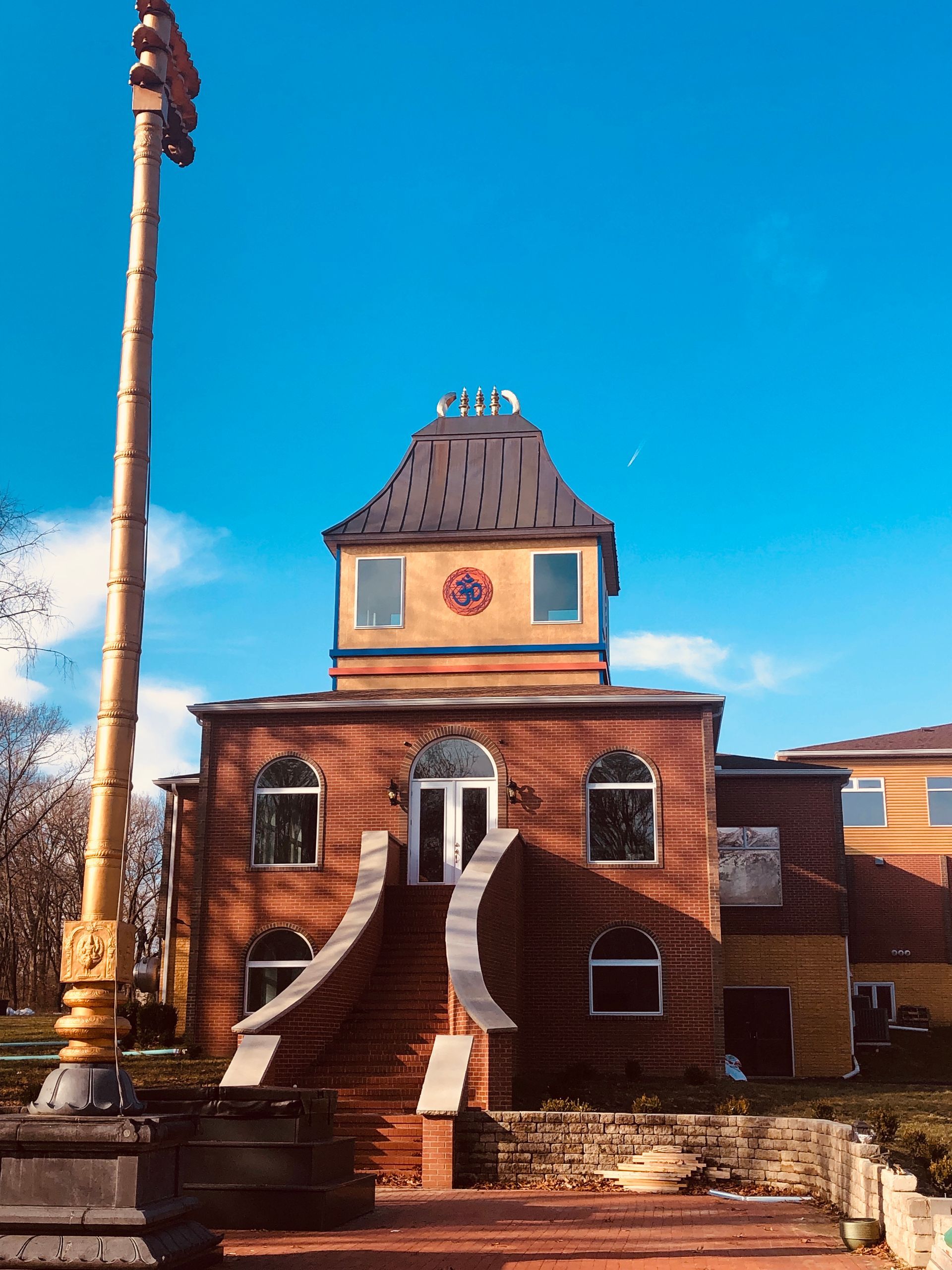 View of a flawless EPDM roofing surface, demonstrating superior installation quality Copper Standing Seam Cupola Roof on Hindu Temple of Central Illinois - Exquisite Craftsmanship and Timeless Beauty