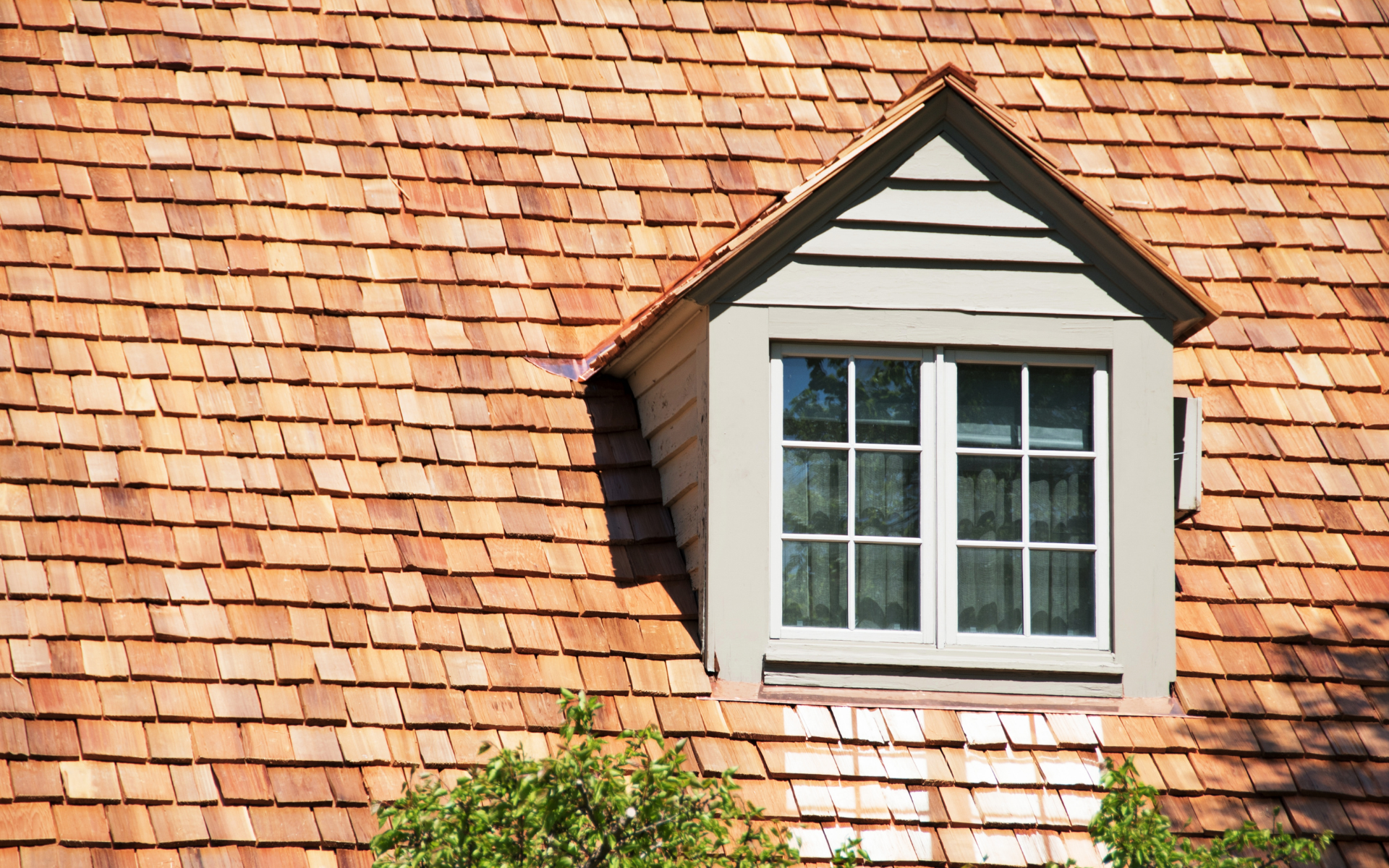 A wooden roof with a window on it