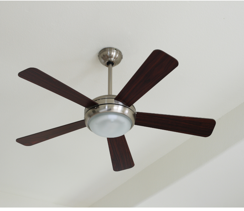A ceiling fan with wooden blades and a light
