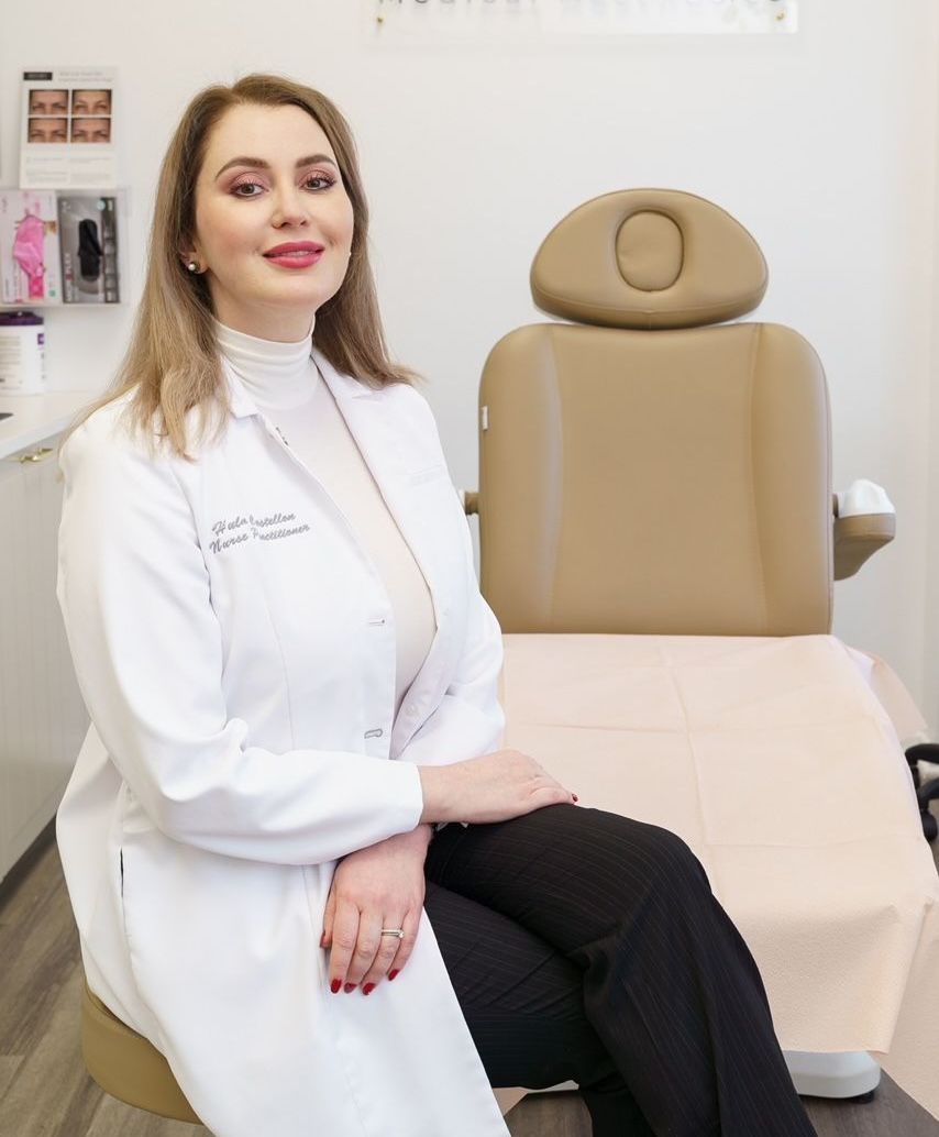 Hula Castellon, FNP, MSN, and owner of Uplifted Aesthetics in her treatment room before a TMJ Treatment for a patient.
