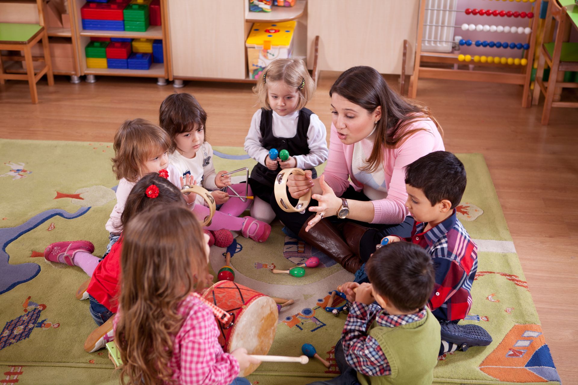 Teacher Teaching Students — Register, GA — Bright Minds Playhouse